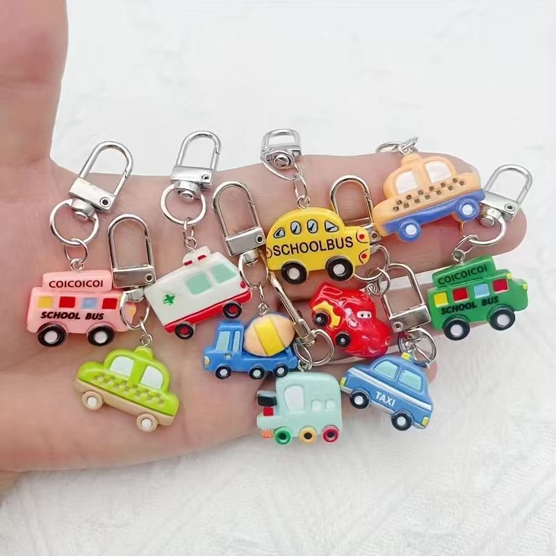 Phone Accessories Keychain - 10個入り樹脂製漫画風車キーホルダー、荷物や携帯電話アクセサリーに最適、ギフトに最適です。